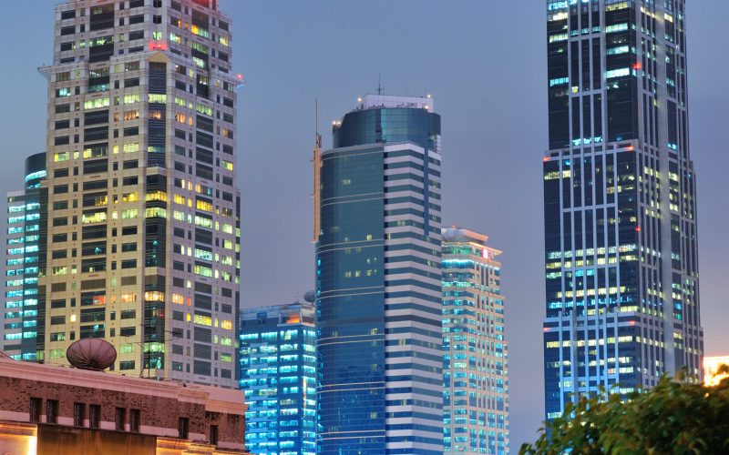 Shanghai at night with urban skyscrapers and lights